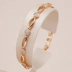 Elegant guldbelagt armbånd